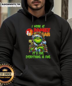 Cozy 'Top Grinch Christmas Tree X Family Dollar I Work At It's Fine Everything Is Fine' hoodie displayed on a festive background.