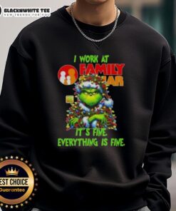 Alt Text: Cozy Top Grinch Christmas Tree sweatshirt from Family Dollar, showcasing 'I Work At It's Fine Everything Is Fine' design.