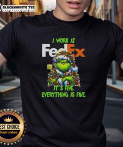 Top Grinch Christmas Tree T-shirt featuring 'I Work At Its Fine Everything Is Fine' design for festive holiday spirit.