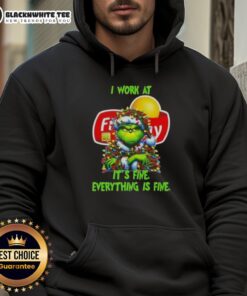 Cozy hoodie featuring 'It's Fine, Everything is Fine' design inspired by the Grinch, perfect for holiday cheer.
