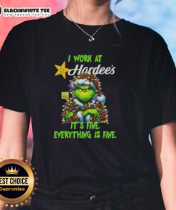 Alt Text: Top Grinch Christmas Tree graphic on 'I Work At It's Fine Everything Is Fine' Ladies Tee from Hardee's.