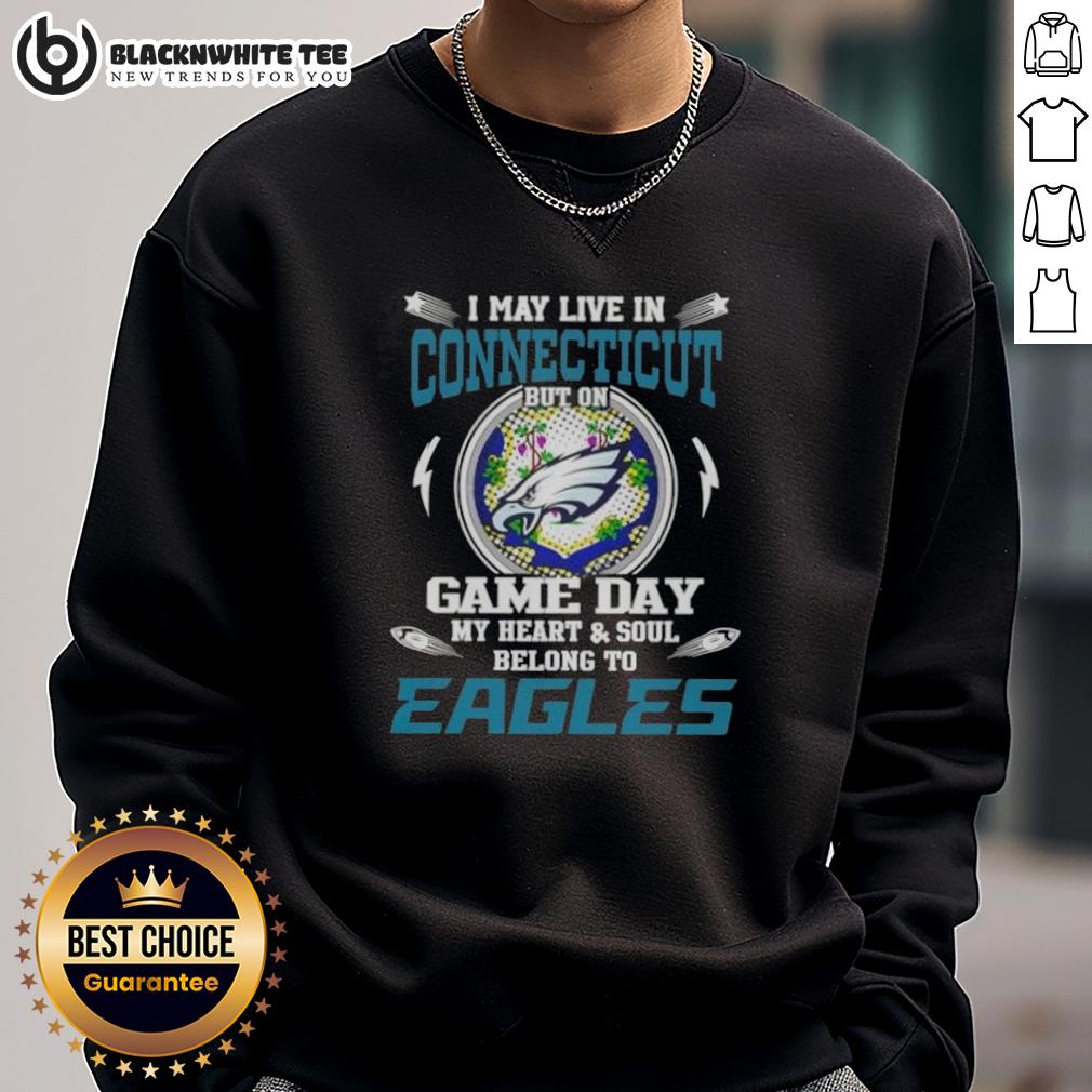 Top I May Live In Connecticut But On Game Day My Heart And Soul Belongs To Philadelphia Eagles Sweatshirt Alt Text: Cozy sweatshirt with 'I may live in Connecticut, but my heart belongs to Philadelphia Eagles' design.