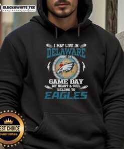 Delaware fan wearing a Philadelphia Eagles hoodie on game day, showcasing team spirit and pride.