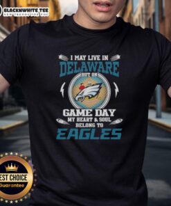 Alt Text: Philadelphia Eagles t-shirt with 'I May Live In Delaware But My Heart Belongs To Eagles' slogan.