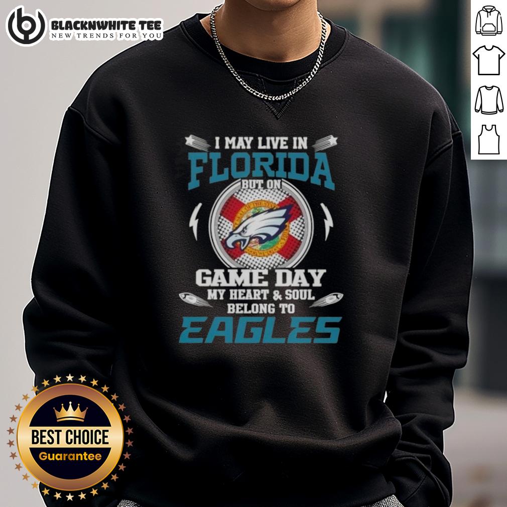 Top I May Live In Florida But On Game Day My Heart And Soul Belongs To Philadelphia Eagles Sweatshirt Cozy sweatshirt featuring 'I May Live In Florida But On Game Day My Heart Belongs To Philadelphia Eagles' design.