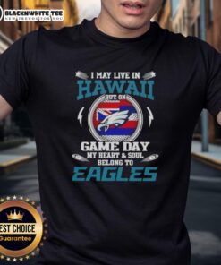 Top I May Live In Hawaii But On Game Day My Heart Belongs To Philadelphia Eagles T-Shirt design featuring team colors.