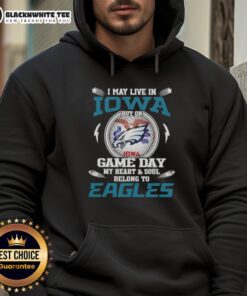 Person wearing Philadelphia Eagles hoodie, showcasing pride for the team despite living in Iowa on game day.