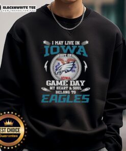 Cozy sweatshirt reading 'I may live in Iowa but my heart belongs to the Philadelphia Eagles' perfect for game day.