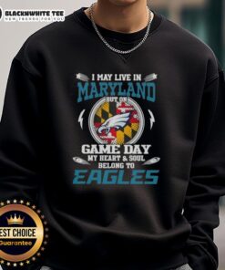 Cozy sweatshirt featuring 'I May Live in Maryland But On Game Day My Heart Belongs to Philadelphia Eagles' design.