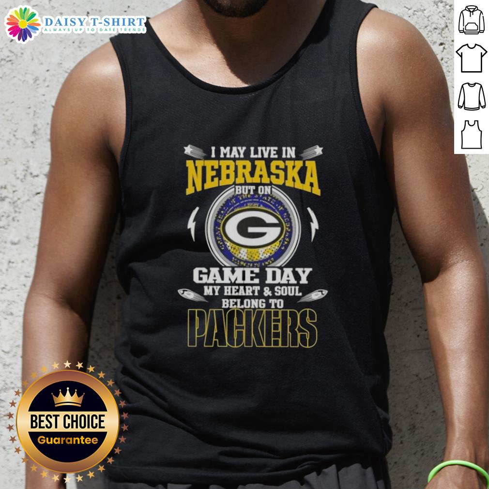 Top I May Live In Nebraska But On Game Day My Heart And Soul Belongs To Green Bay Packers Tank Top Green Bay Packers tank top with 'I May Live In Nebraska' slogan, perfect for game day fans supporting their team.