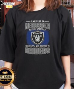 Top I May Live In Nebraska But On Gameday My Heart And Soul Belongs To Raiders Ladies Tee showcasing team spirit.