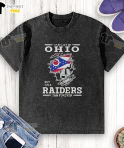 Top I May Live In Ohio But I'm A Raiders Fan Forever washed t-shirt showcasing team pride and casual style.