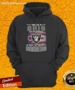 Alt Text: Cozy Raiders hoodie with 'I May Live In Ohio But On Gameday My Heart Belongs To Raiders' design displayed outdoors.