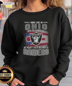 Ohio fan wearing a Raiders sweatshirt, showcasing team spirit on gameday with a heart and soul dedicated to the Raiders.