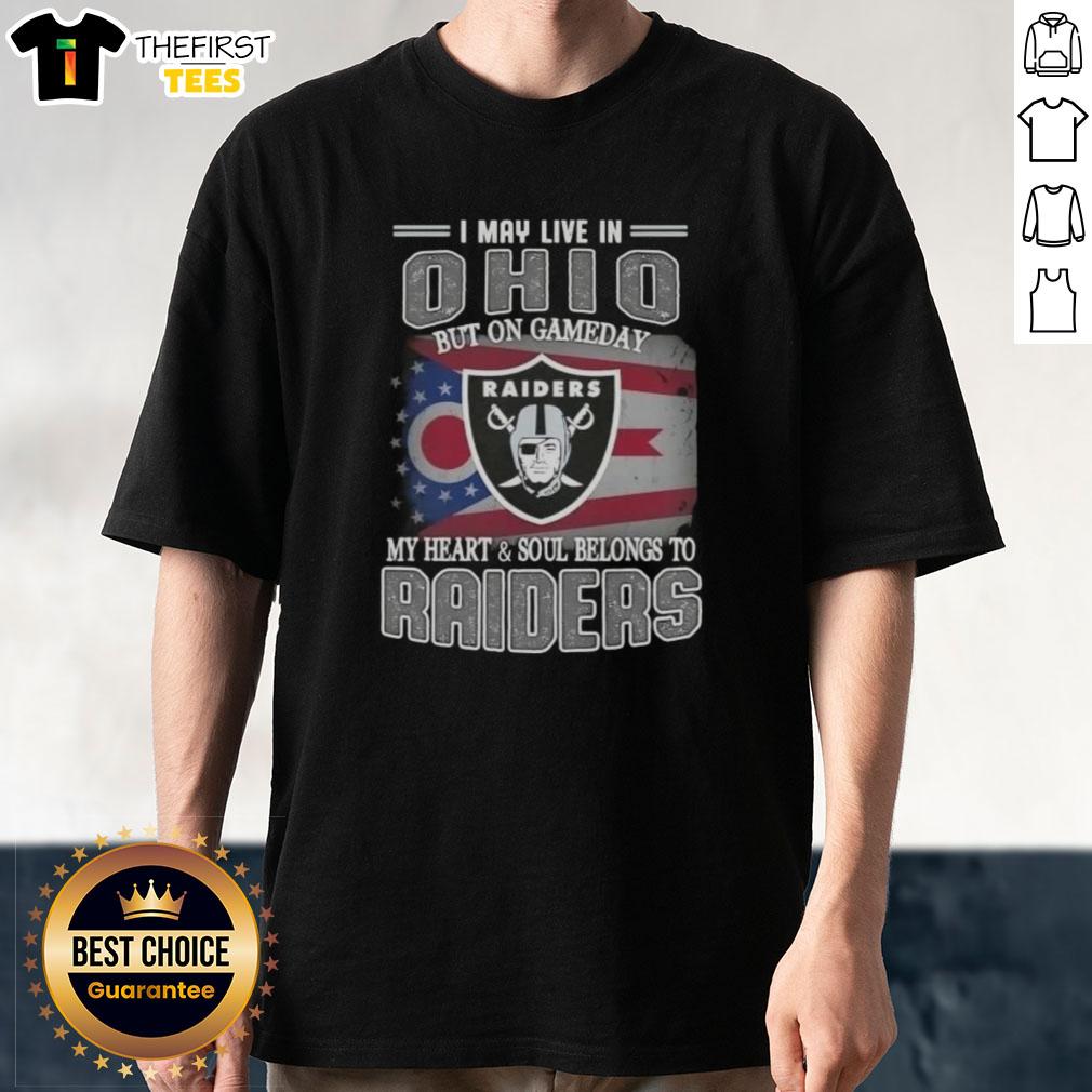 top-i-may-live-in-ohio-but-on-gameday-my-heart-and-soul-belongs-to-raiders-t-shirt-1 Alt Text: Top I May Live In Ohio But On Gameday My Heart And Soul Belongs To Raiders T-Shirt displayed on a hanger.