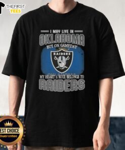 Alt Text: Top I May Live In Oklahoma But On Gameday My Heart And Soul Belongs To Raiders T-Shirt, showing Raiders pride.