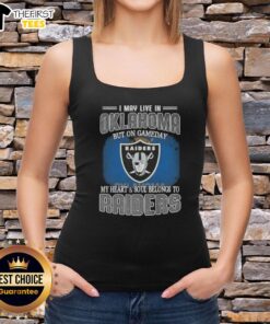 Stylish tank top reading 'I May Live In Oklahoma But On Gameday My Heart And Soul Belongs To Raiders' for fans.