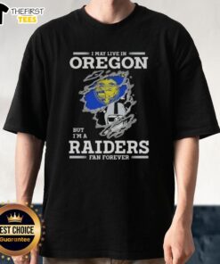 Alt Text: Oregon Raiders fan t-shirt featuring 'I May Live In Oregon But Im A Raiders Fan Forever' design in bold letters.