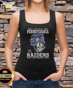 Raiders fan wearing a 'Top I May Live in Pennsylvania But I'm a Raiders Fan Forever' tank top, showcasing team pride.
