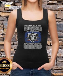 Stylish tank top reading 'I May Live In Pennsylvania But On Gameday My Heart And Soul Belongs To Raiders' for fans.