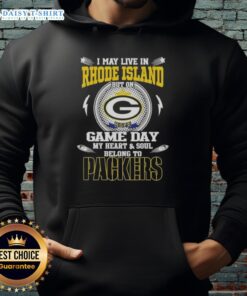 Person wearing a Green Bay Packers hoodie, showcasing team spirit while living in Rhode Island on game day.