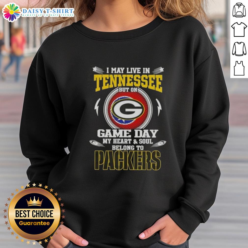 Top I May Live In Tennessee But On Game Day My Heart And Soul Belongs To Green Bay Packers Sweatshirt Green Bay Packers sweatshirt showcasing team spirit for fans living in Tennessee on game day.