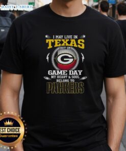 Green Bay Packers T-shirt with 'I May Live In Texas But My Heart Belongs To Green Bay' slogan, perfect for game day.
