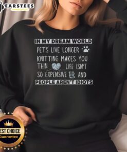 Cozy knitting sweatshirt featuring the phrase In My Dream World, Pets Live Longer, perfect for pet lovers.