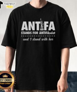 Alt Text: Top Liberty of Statue Antifa Stand T-Shirt featuring 'I Stand With Her' slogan, promoting antifascist values.