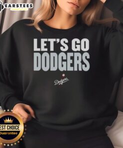 Alt Text: Top Los Angeles Dodgers slogan sweatshirt with 'Let's Go Dodgers' design, perfect for fans and game day attire.