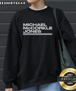 Top Mac Jones San Francisco 49ers sweatshirt featuring Michael McCorkle Jones design in vibrant colors.