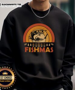 Retro sunset sweatshirt featuring 'Top Merry Fishmas' design, perfect for Christmas fishing enthusiasts.