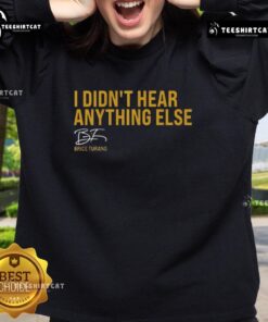 Brice Turang wearing a Milwaukee Brewers sweatshirt with 'I Didn't Hear Anything Else' slogan at a game.