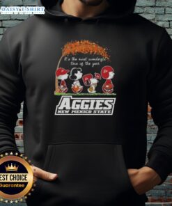 Alt Text: Top Peanuts Snoopy and Friends hoodie featuring 'It's The Most Wonderful Time of The Year' for Aggies New Mexico State.