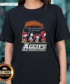 Alt Text: Top Peanuts Snoopy and Friends holiday tee for Aggies New Mexico State ladies, celebrating the most wonderful time of the year.