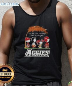 Alt Text: Top Peanuts Snoopy and Friends tank top featuring 'It's the Most Wonderful Time of the Year' design from Aggies New Mexico State.