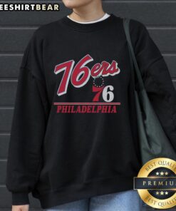 Vintage sweatshirt featuring the Philadelphia 76ers logo, perfect for fans and collectors of retro NBA apparel.