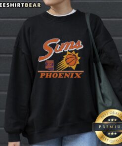 Vintage sweatshirt featuring the top Phoenix Suns logo, perfect for basketball fans and retro sportswear enthusiasts.