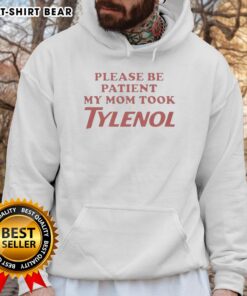 Funny 'Please Be Patient My Mom Took Tylenol' hoodie design for those who appreciate humor in parenting and comfort wear.