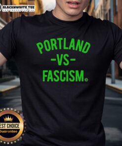 Top Portland Vs Fascism And Ice T-Shirt featuring bold graphic design, promoting anti-fascism and social justice themes.
