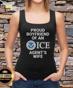 Top proud boyfriend wearing an ICE agent's wife tank top, showcasing love and support with a stylish design.