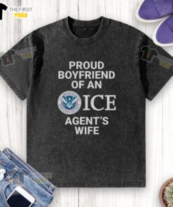 Top proud boyfriend wearing an ICE agent's wife washed t-shirt, showcasing support and pride in his relationship.