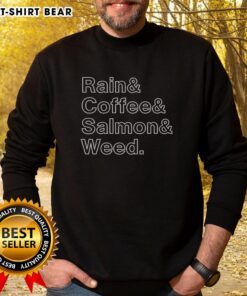 Cozy top rain and coffee sweatshirt featuring salmon and weed graphic, perfect for casual wear on rainy days.
