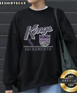 Vintage Sacramento Kings Fly By sweatshirt featuring classic design and team colors for fans and collectors.