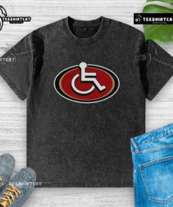 Alt Text: Vintage-style washed t-shirt featuring a parody of the San Francisco 49ers NFL 2025 logo in bold colors.