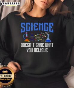 Cozy sweatshirt featuring 'Top Science Doesn't Care What You Believe' printed design, perfect for science enthusiasts and skeptics.