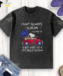Alt Text: Top Snoopy driving car graphic on a washed t-shirt, featuring the quote about Bills season and TV screams.