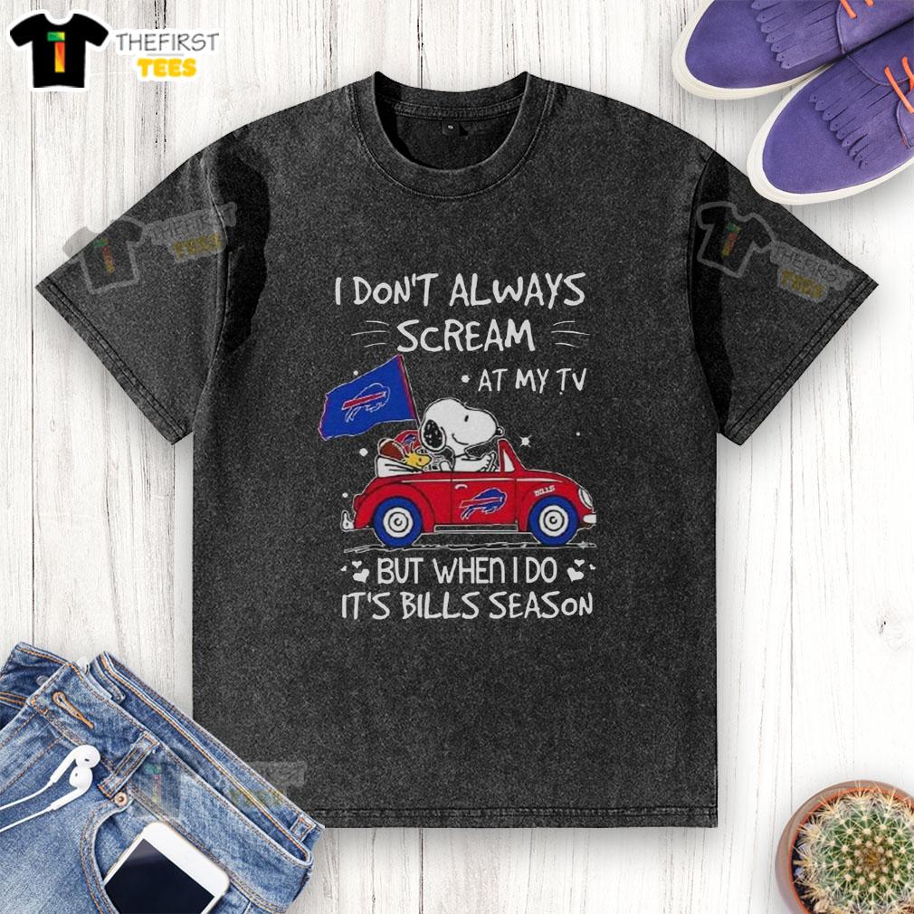 top-snoopy-driving-car-i-dont-always-scream-at-my-tv-but-when-i-do-its-bills-season-washed-t-shirt Alt Text: Top Snoopy driving car graphic on a washed t-shirt, featuring the quote about Bills season and TV screams.