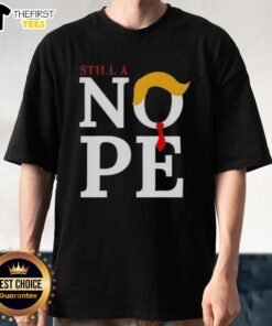 Top Still A Nope Trump Hair T-Shirt featuring a humorous design and bold text, perfect for political satire fans.