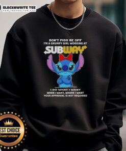 Grumpy girl wearing a 'Don't Piss Me Off' sweatshirt at Subway, showcasing fun top-stitch design and casual style.